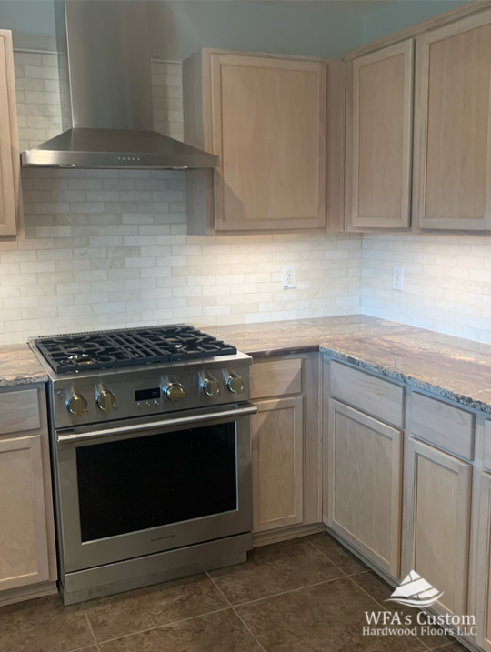 light brown tile backsplash installation, wfa's custom hardwood floors, houston texas